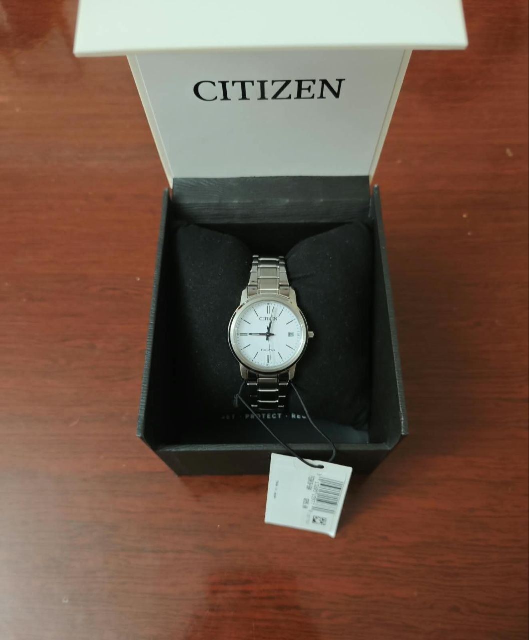 Часы Citizen (солнечная зарядка), новые в упаковке