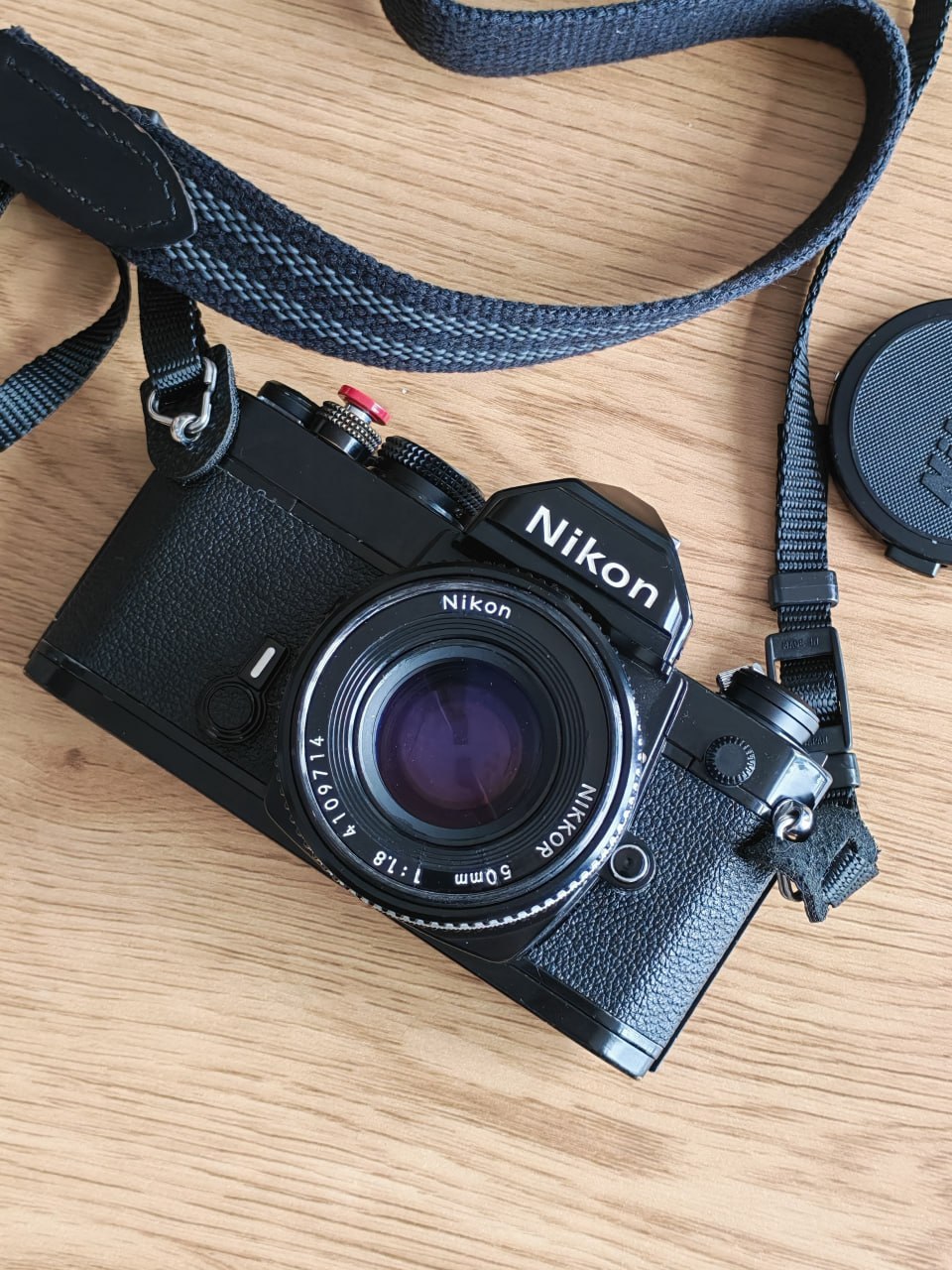 Плёночный фотоаппарат Nikon FM с объективом Nikkor AI-S 50mm F1.8