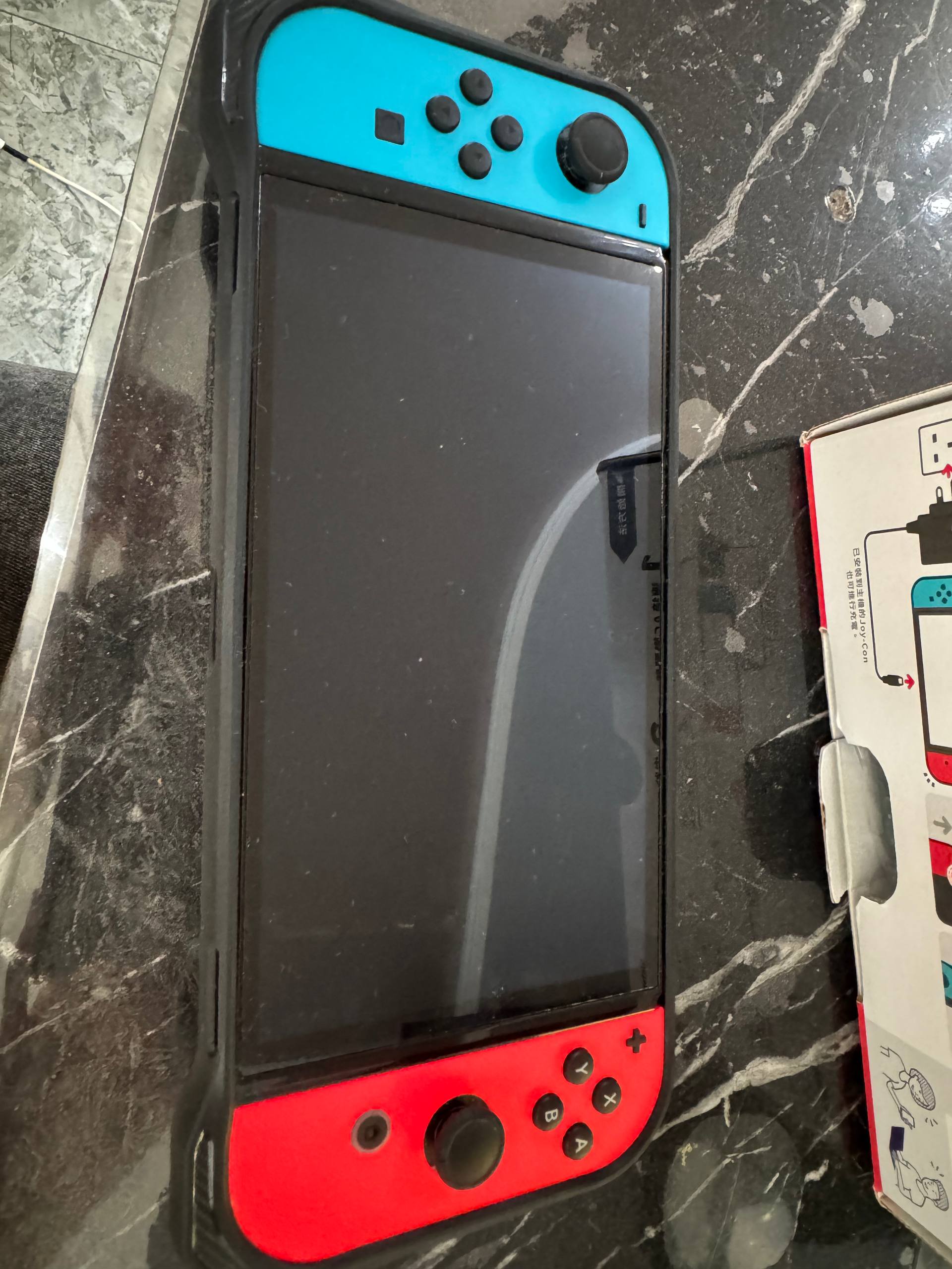 Nintendo Switch OLED (Neon Blue/Red)