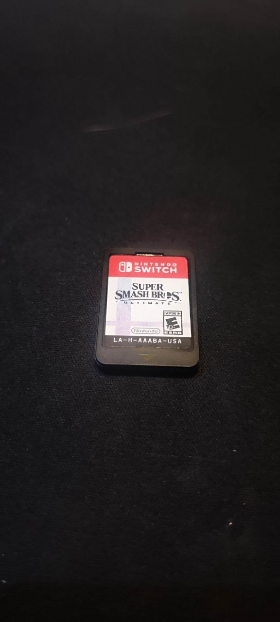 Nintendo Switch Lite с MicroSD 128 ГБ и Super Smash Bros. Ultimate