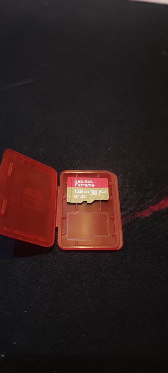 Nintendo Switch Lite с MicroSD 128 ГБ и Super Smash Bros. Ultimate