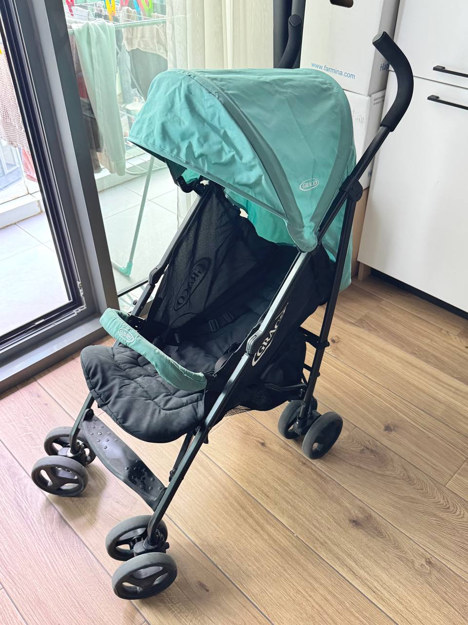 Детская прогулочная коляска Graco, мятная