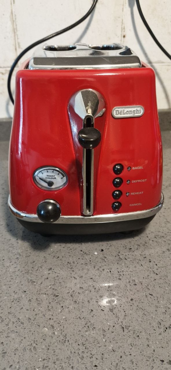 Тостер Delonghi