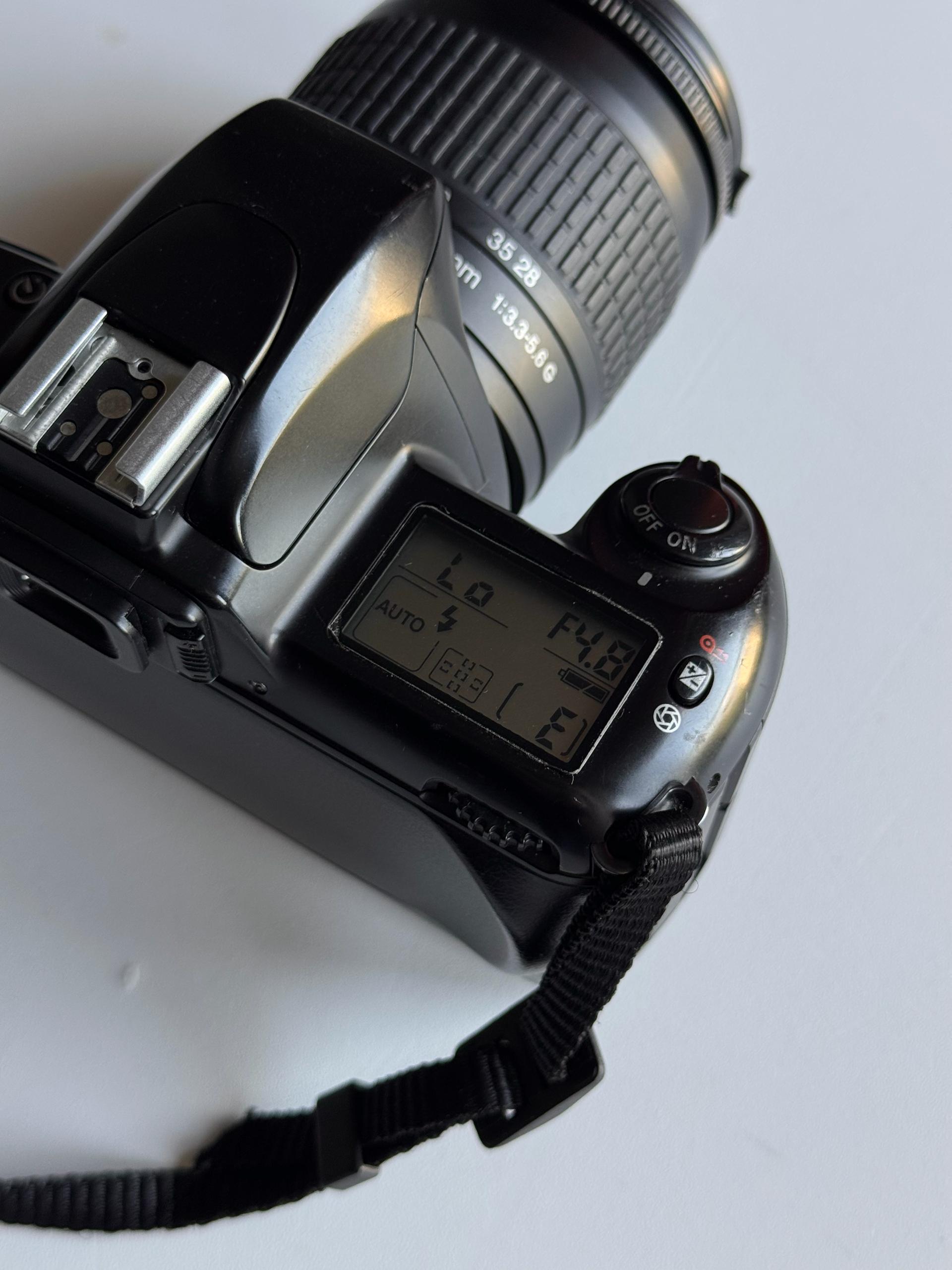 Пленочный фотоаппарат Nikon F65 + объектив AF Nikkor 28-80mm
