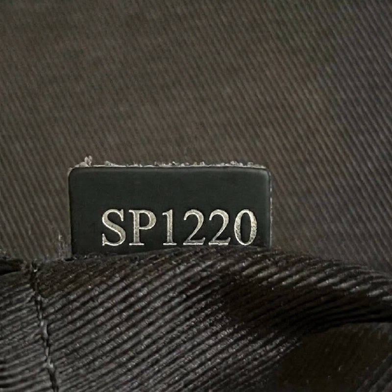 Сумка Louis Vuitton District PM Monogram